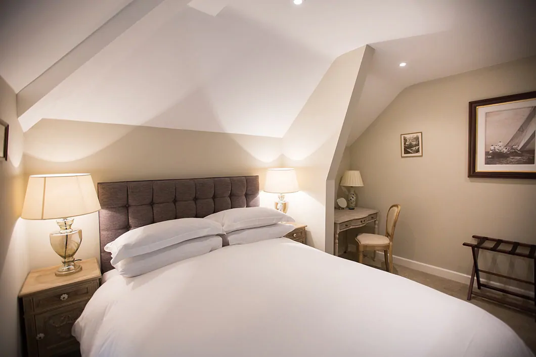 A twin bedroom at a neighbouring property