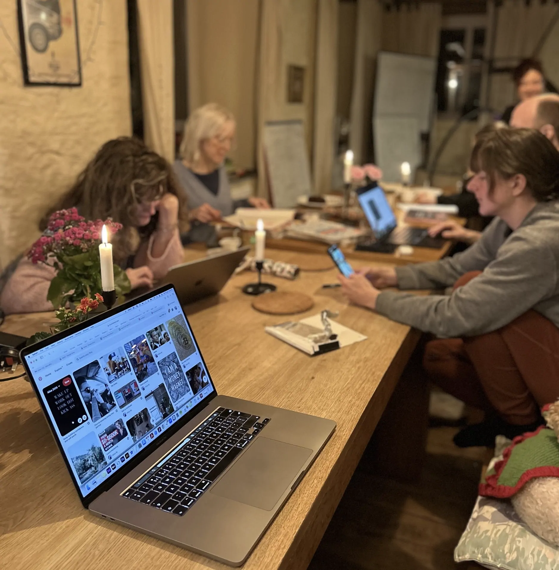 Colivers working together at the table after dark