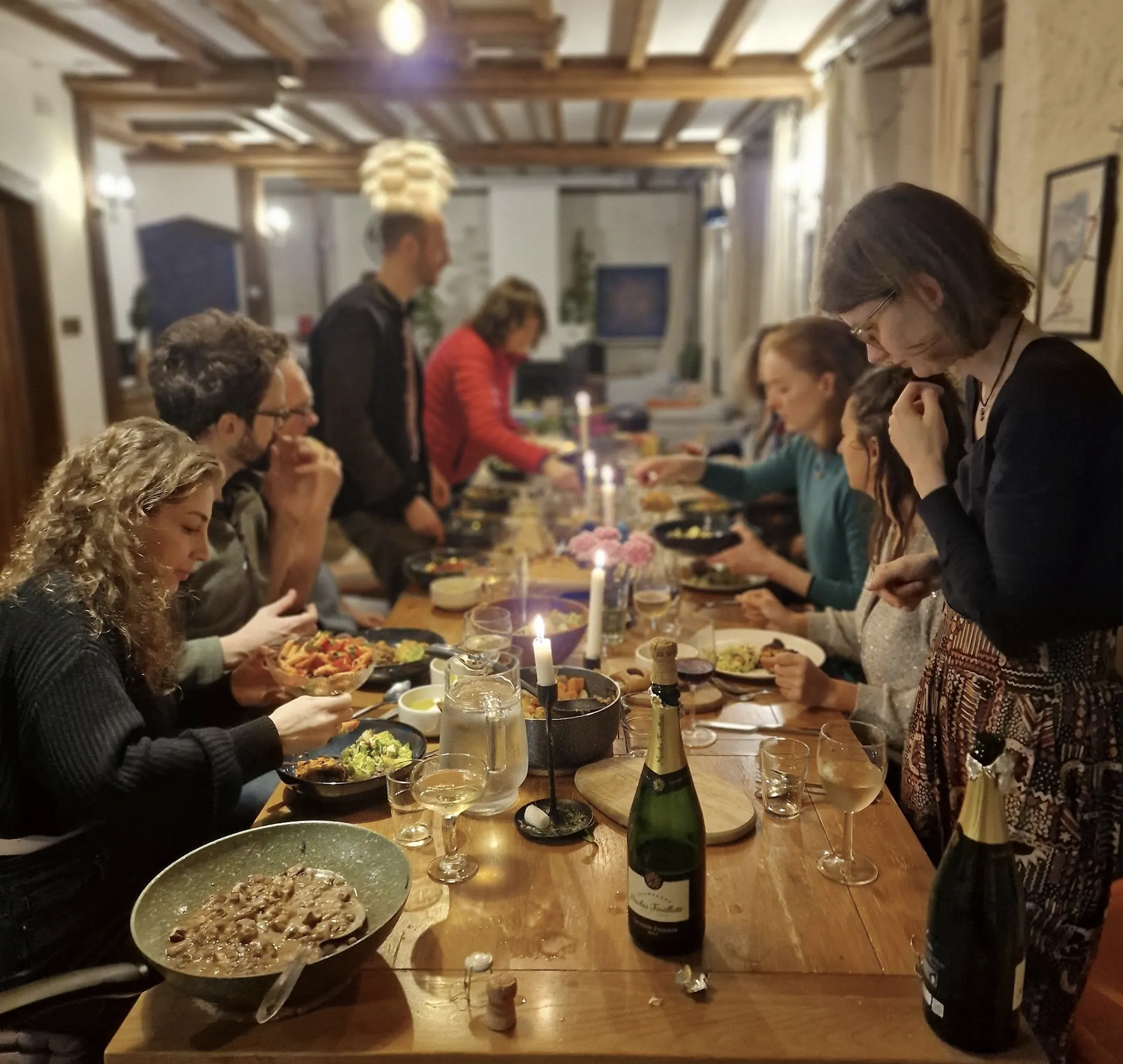 A long shared dinner by candlelight